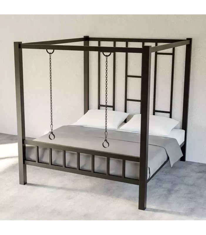 BDSM-säng i metall med handbojor